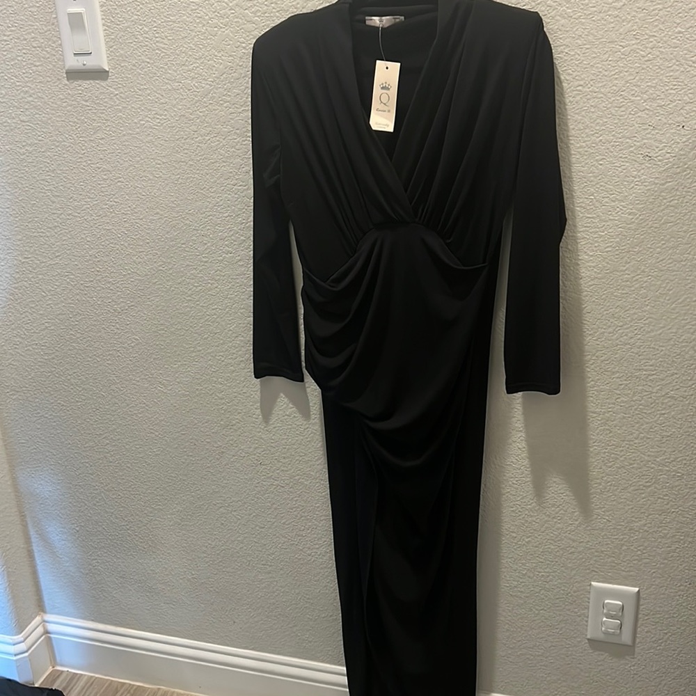 Sexy black maternity dress with a high slit and shoulder pads